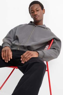 Oversized sweatvest met capuchon