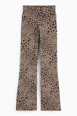 Rozkloszowane legginsy - nadruk w cętki