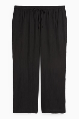 Pantaloni di stoffa - vita alta - gamba ampia - tessuto tramato