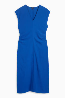 Vestito aderente con scollo a V