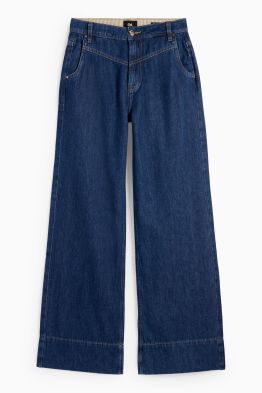 Jeans a gamba larga - vita media