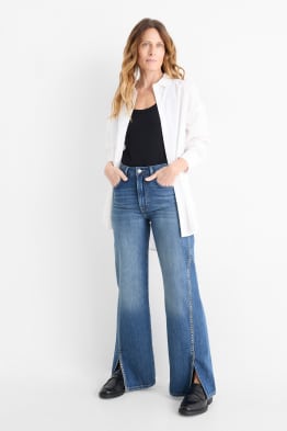 Jeans a gamba larga - vita media