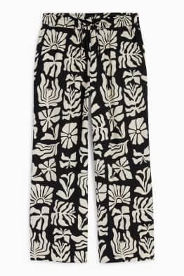 Pantaloni - vita alta - gamba ampia - con motivi - tessuto tramato