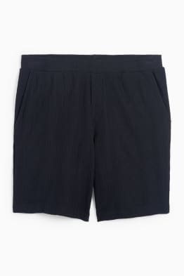 Pantalons curts - acanalats
