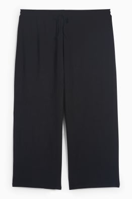 Pantaloni in jersey - vita media - gamba ampia - tessuto tramato