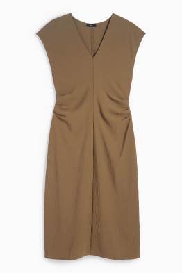Vestito aderente con scollo a V