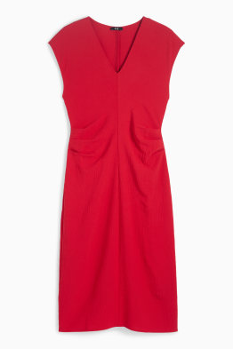 Vestito aderente con scollo a V