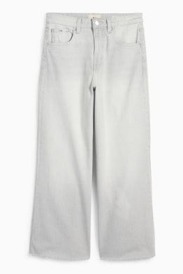 Jeans a gamba larga - vita media
