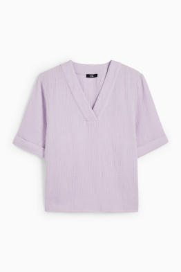 Blusa de muselina con escote en pico
