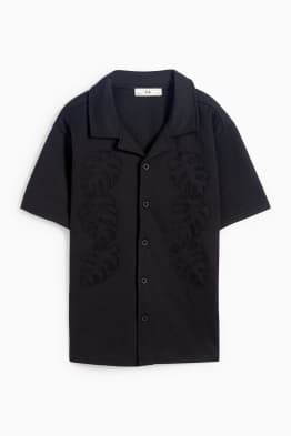 Camisa