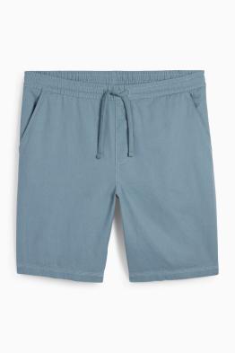 Shorts con componente di lino