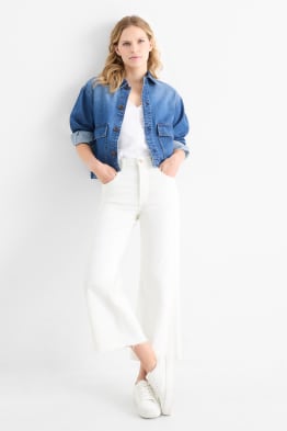 Jeans a gamba larga - vita media
