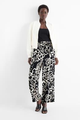 Pantaloni di stoffa - vita media - gamba ampia - a fiori