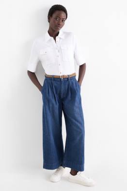 Jeans a gamba larga con cintura - vita media