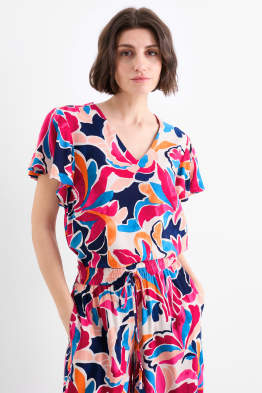 Blusa con escote en pico - estampada