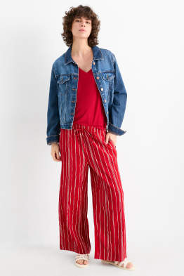 Pantaloni di stoffa - vita alta - gamba larga - a righe - tessuto tramato