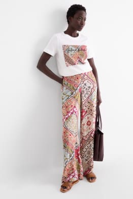Pantaloni - vita media - gamba ampia - a fiori