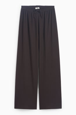Broek van jersey - mid waist - wide leg - met structuur