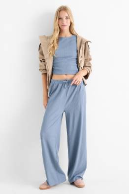 Broek van jersey - mid waist - wide leg - met structuur