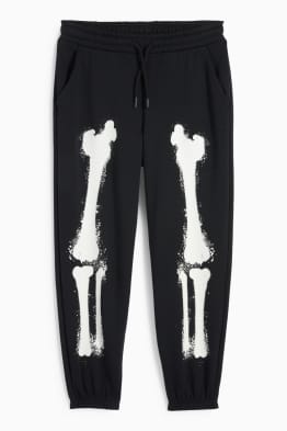 Esquelet - pantalons de xandall - brilla en la foscor