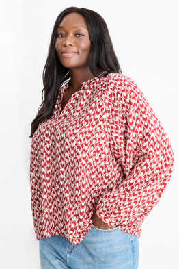 Blusa con escote en pico - estampada