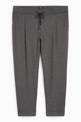 Pantalon en jersey - mid waist - tapered fit - texturée