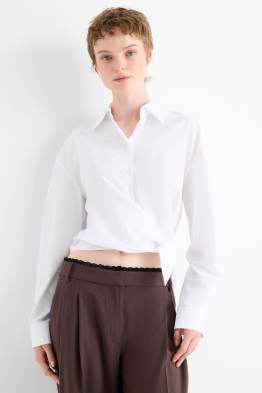 Blusa corta con dettaglio nodo