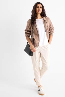 Žerzejové kalhoty - mid waist - tapered fit