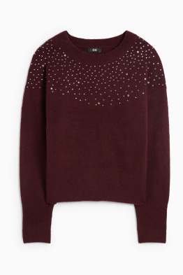 Pull orné de pierres de strass