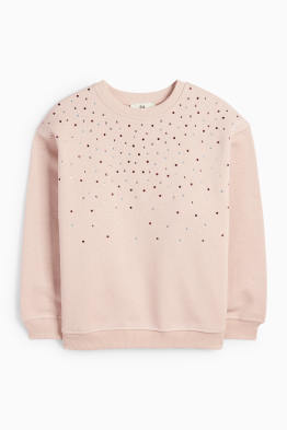 Sweat orné de pierres de strass