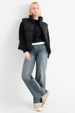 Jeans a gamba larga - vita media