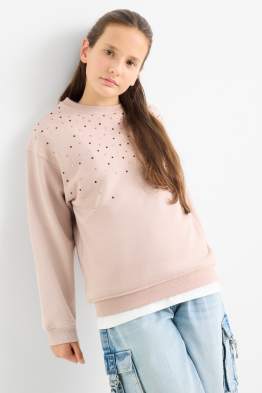 Sweat orné de pierres de strass