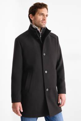 Coat with faux fur trim