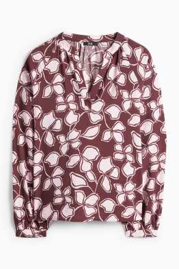 Brusa amb coll en punta - de flors