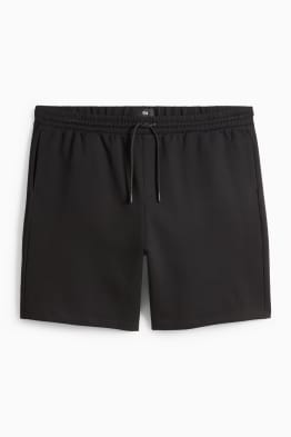 Pantalons curts de xandall - texturats