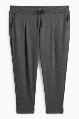Jersey broek - mid waist - tapered fit - met structuur