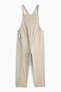 Těhotenské džínové kalhoty s laclem