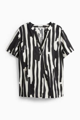 Brusa amb coll en punta - mescla de lli - amb motiu