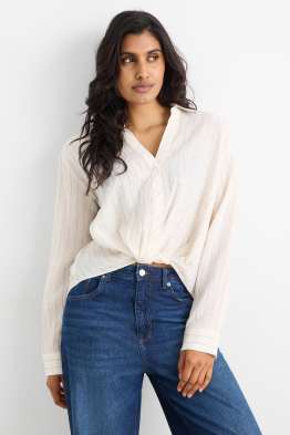 Blouse met knoop in de stof - gestreept