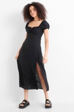 Vestit amb obertura i component de lli - de punt de niu d'abella