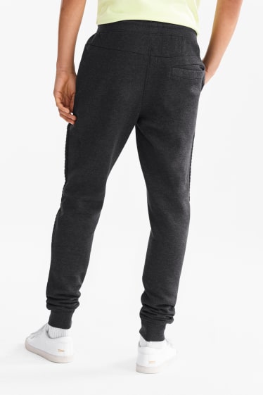 Hommes - CLOCKHOUSE  - pantalon de jogging - noir