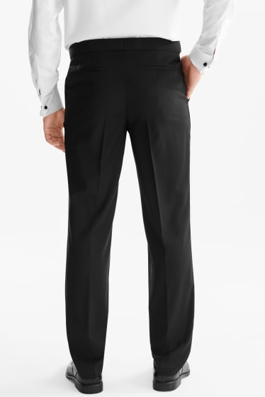 Hommes - Pantalon en laine de smoking à coordonner - tailored fit - noir