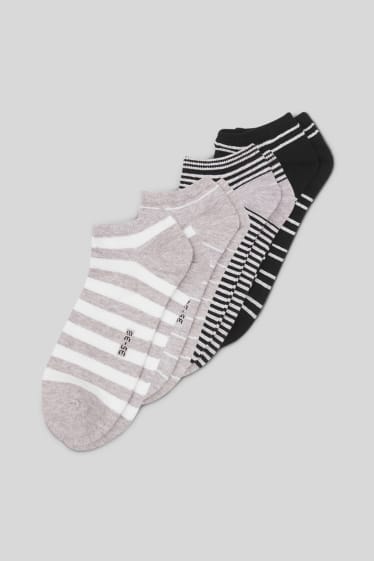 Femmes - Lot de 4 - chaussettes de sport - rayées - noir / blanc