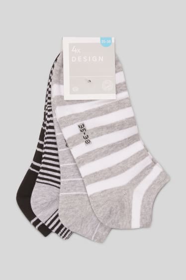 Femmes - Lot de 4 - chaussettes de sport - rayées - noir / blanc