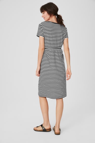 Women - Nursing dress - striped - white / black