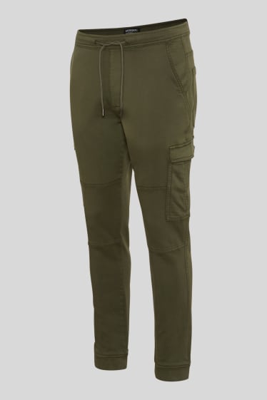 Mężczyźni - CLOCKHOUSE - spodnie bojówki - slim fit - zielony