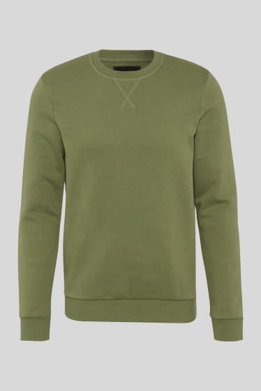 Mężczyźni - CLOCKHOUSE - bluza dresowa - zielony
