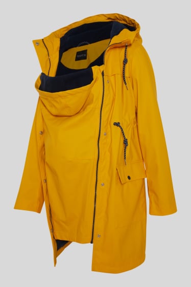 Women - Maternity rain jacket - with baby pouch - yellow