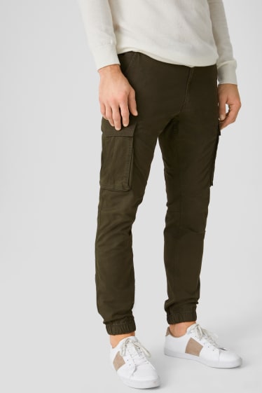 Hommes - Pantalon cargo - jambes fuselées - jean vert
