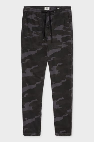 Hombre - Pantalón - Tapered Fit - gris / negro
